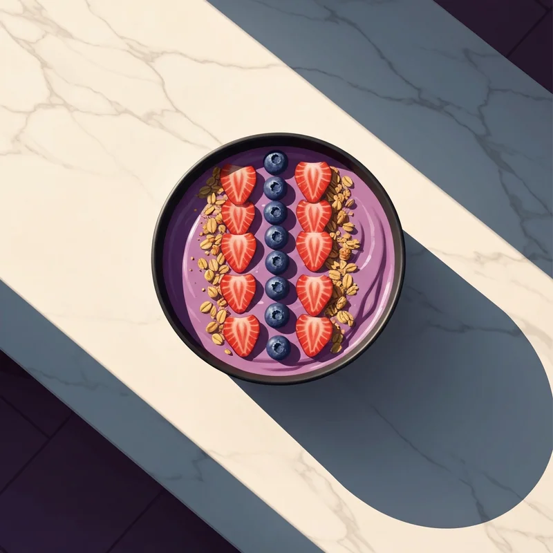 A perfectly thick smoothie bowl showing how to make acai bowl at home with fresh fruit and granola.